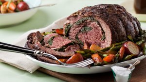 Arugula-Stuffed Leg of Lamb with Roasted Spring Vegetables
