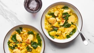 Azafrán Soup With Spinach Greens and Yellow Cornmeal Dumplings