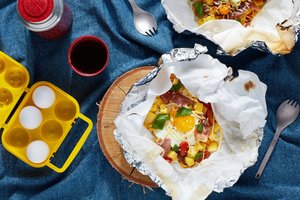 Breakfast Foil Packs With Polenta, Prosciutto, and Cherry Tomatoes