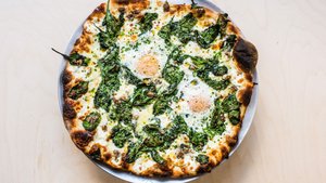 Breakfast Pizza With Sausage, Eggs, Spinach, and Cream
