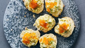 Deviled Eggs on Biscuits With Trout Roe and Dill
