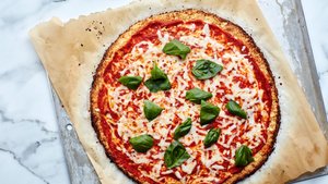 Gluten-Free Cauliflower-Crust Pizza With Tomatoes and Mozzarella