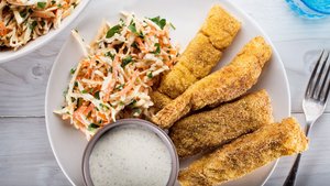Old Bay–Spiced Fish Sticks With Creamy Celery Root and Carrot Slaw