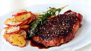 Rib-Eye Steak au Poivre with Balsamic Reduction