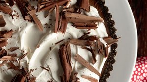 Triple Chocolate Tart with Boozy Whipped Cream